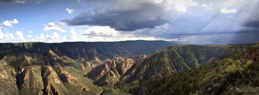 The sun's rays through clouds light up a portion of sycamore canyon from Sycamore Point